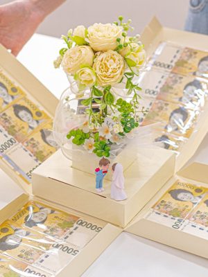 A house with a heart “special” surprise flower and tree pocket money box