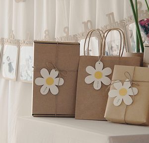 first birthday party event gift wrap flower tag gift